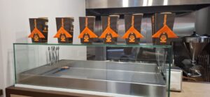 Foto del escurridor de los churros con el Packaging en la parte superior